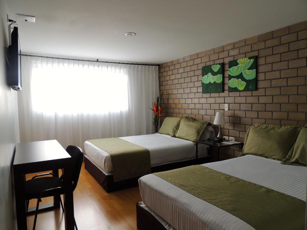 Hotel Portal De Milan Манисалес Номер фото